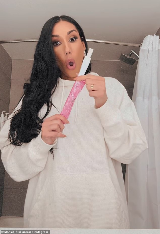 Monica took to Instagram on Thursday where she filmed herself taking a pregnancy test