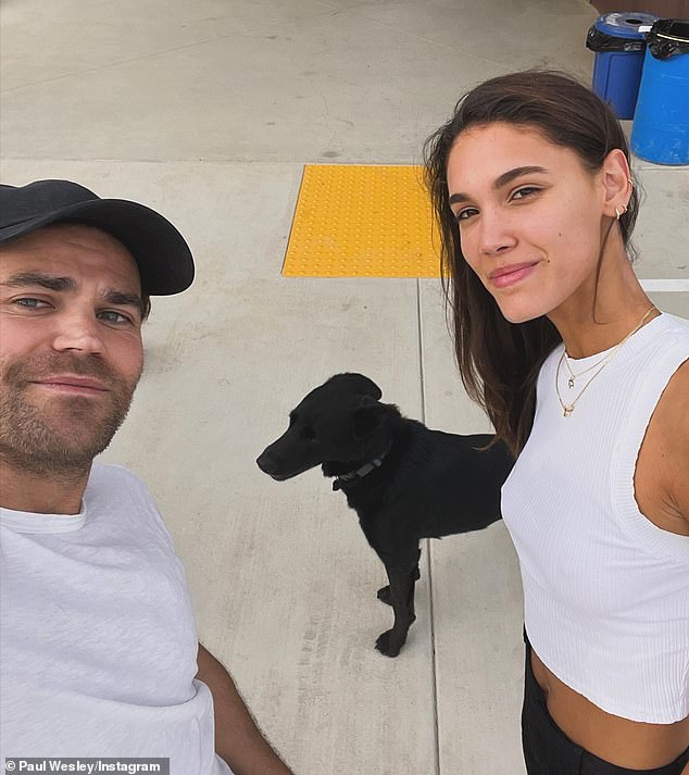 The Ramon still shares custody of little Greggy with her ex-husband – The Vampire Diaries alum Paul Wesley (L, pictured February 14) – who has since moved on with 23-year-old German model Natalie Kuckenburg (R)