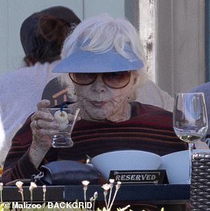 The acting legend was seen at Kristy's Village Cafe in Malibu with a female assistant for drinks and snacks