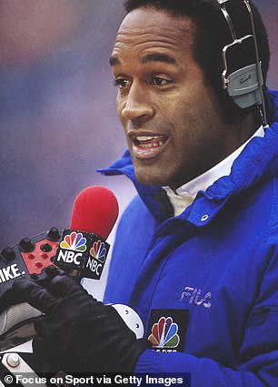 OJ Simpson talks into a microphone during his career as a commentator for NBC Sports in 1990