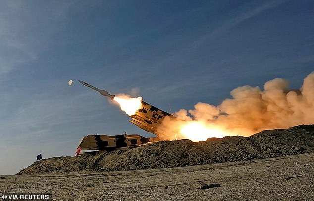 A missile is launched during a military exercise at a secret location in southern Iran, in this handout image obtained January 19, 2024