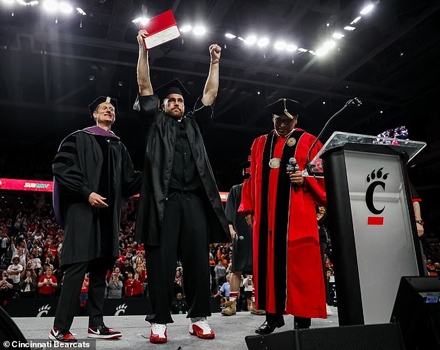 Three-time Super Bowl winner Travis, 34, has long been mocked by older brother Jason for missing a flight to graduation, but finally received his diploma on Thursday night