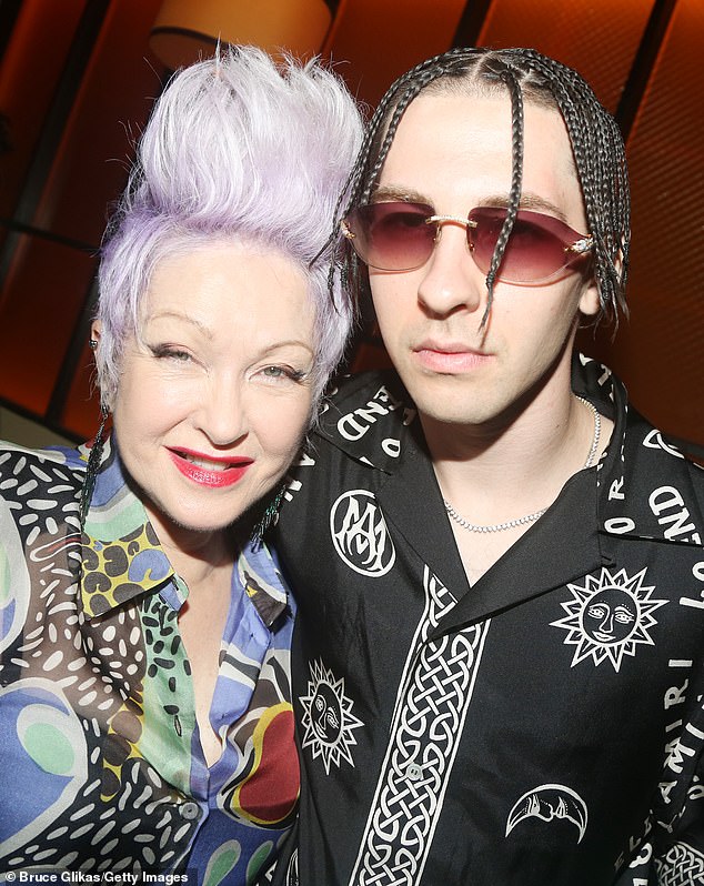 Cyndi Lauper and son Declyn "Dex" Lauper poses at the Tribeca Film Festival after-party premiere for the Cyndi Lauper documentary "Let the canary sing" at Serafina UWS on June 14, 2023