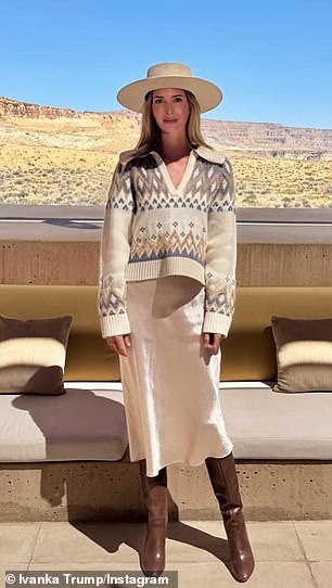 For her fourth outfit, she kept the same hat and western boots, but this time she paired them with a cream sweater and a matching satin dress.