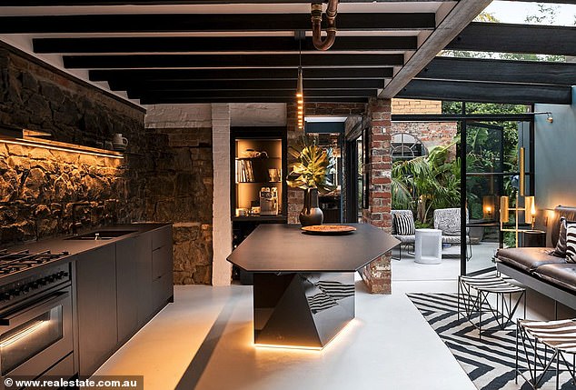 The buyers embarked on major renovations, the Herald Sun reported on Saturday, after Tina made some upgrades herself.  In the photo: the special kitchen and lounge area