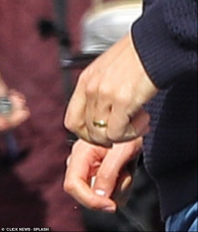 Andrew's wedding ring was seen in photos after it was revealed earlier this month that Amy took it back