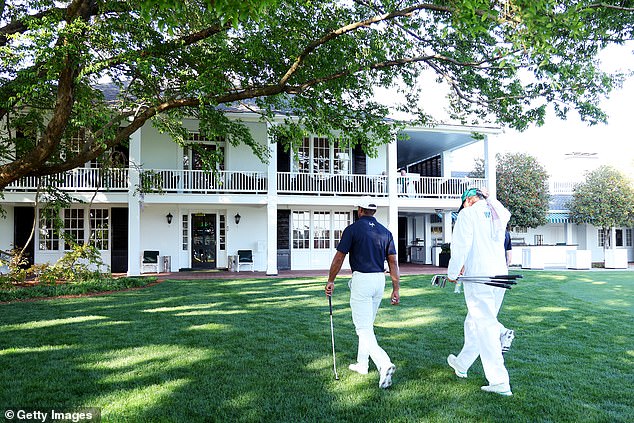 The Augusta National clubhouse has both an open and closed door