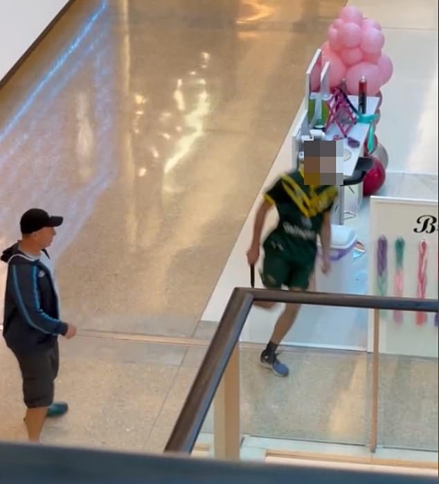 Photos and videos of the incident have been shared online, showing the bearded man, wearing an ARL jersey, running through the shopping complex and allegedly cutting up innocent bystanders