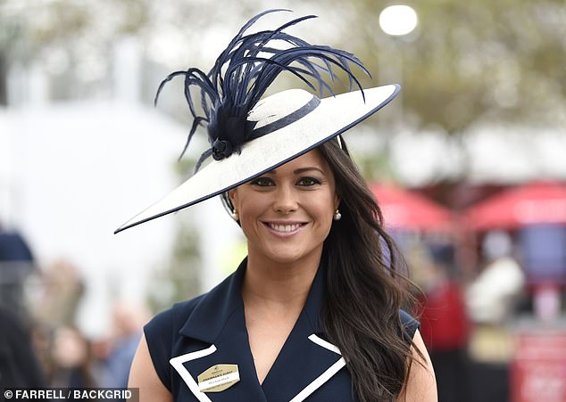 The sportswoman, 35, cinched her waist with a matching belt and tied the outfit together with a matching navy and cream hat