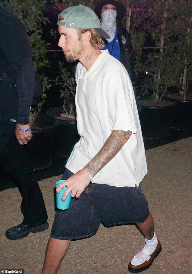 Bieber completed his look for the evening with a two-tone cap, white socks and three-tone loafers