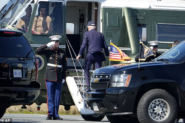 The president is seen boarding his Marine One helicopter.  A national security meeting is being held at the White House