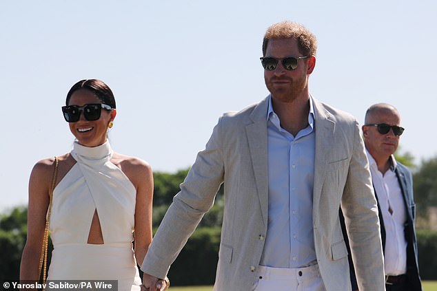 Meghan put on a stunning performance as she and Prince Harry, 39, arrived at the event hand-in-hand on Friday