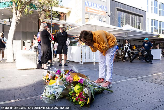 The floral tribute started with one simple bouquet and grows every hour