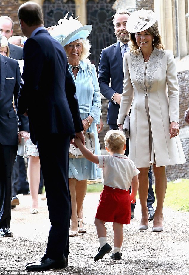 Carole, right, smiles at Prince George as they attend Princess Charlotte's christening in 2015