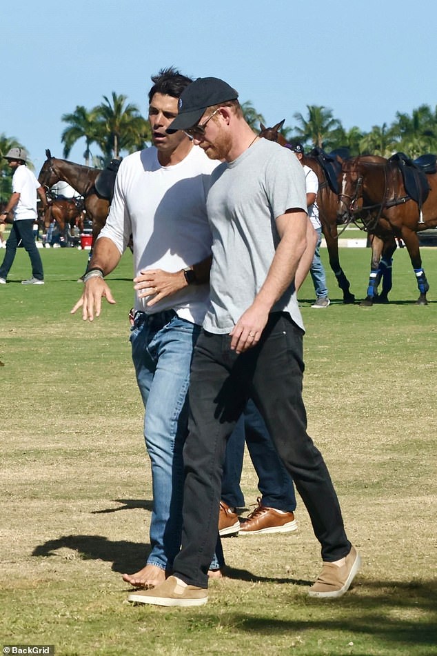 In the photo: Prince Harry was seen walking with his polo teammate Nacho Figueras during the shoot yesterday