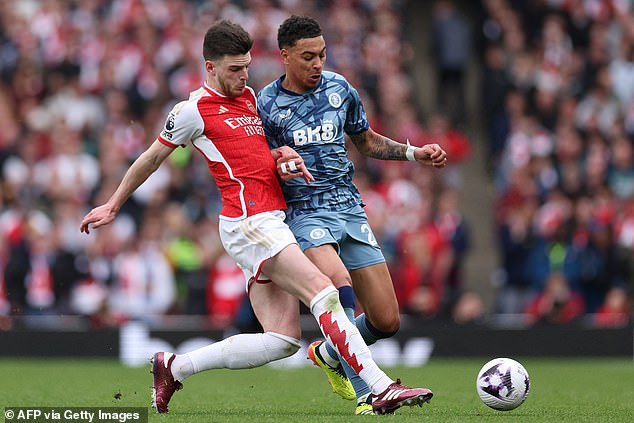 Declan Rice battles with Rogers, with the two battling each other in midfield throughout the match