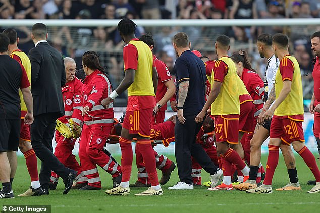 Ndicka collapsed on the pitch after being hit on the ribs and was stretchered off the pitch