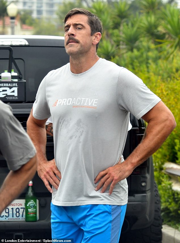 Aaron Rodgers is seen wearing a shirt from Proactive Sports Performance, where he trains