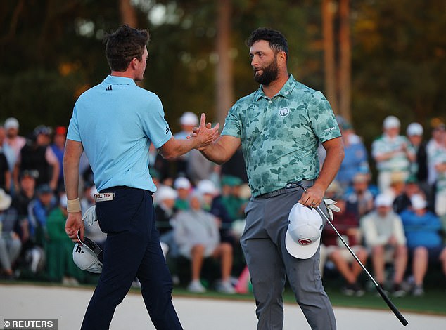 Rahm shakes hands with Nick Dunlap after completing his second round and making the cut