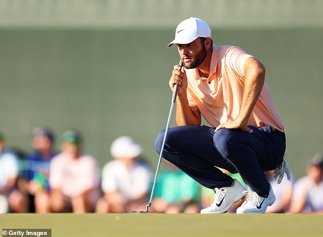 Scheffler makes a putt on the 17th green during the final round of The Masters