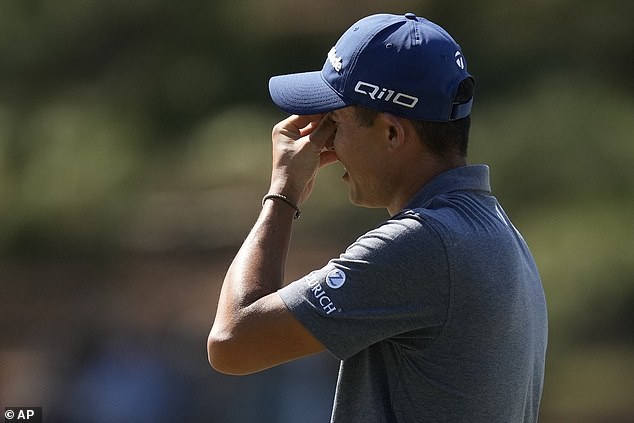 Morikawa reacts to a missed birdie opportunity on hole No. 7. He would finish with a par.