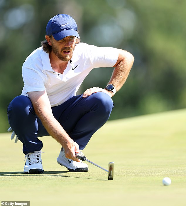 Fleetwood putsts on the eighth green during the final round of The Masters