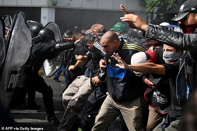 Protesters clashed with police in riot gear in the Argentine capital Buenos Aires on Wednesday