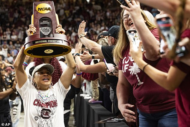 She was in the stylish car for a parade to celebrate her team's national championship win