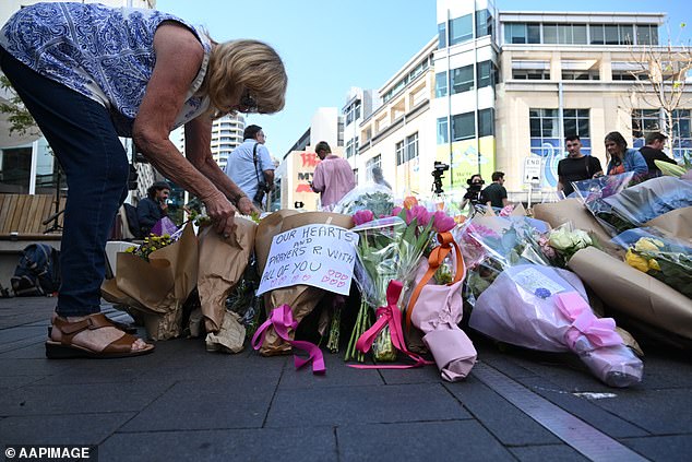 Members of the public in Sydney leave memorials for the six victims of the Bondi Junction Westfield stabbing