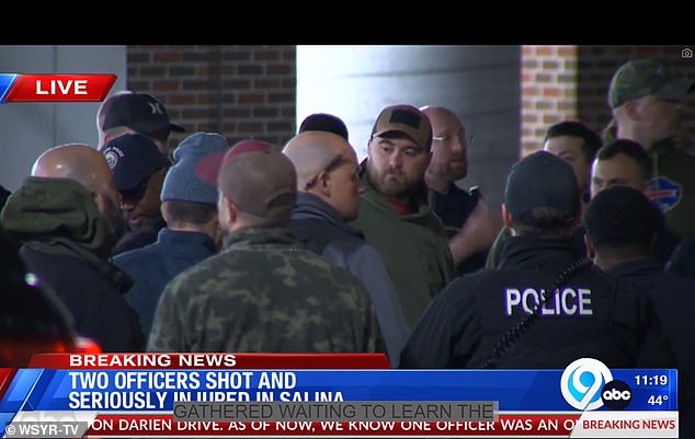 A large number of police officers from across central New York gathered outside Upstate University Hospital where the officers had been taken