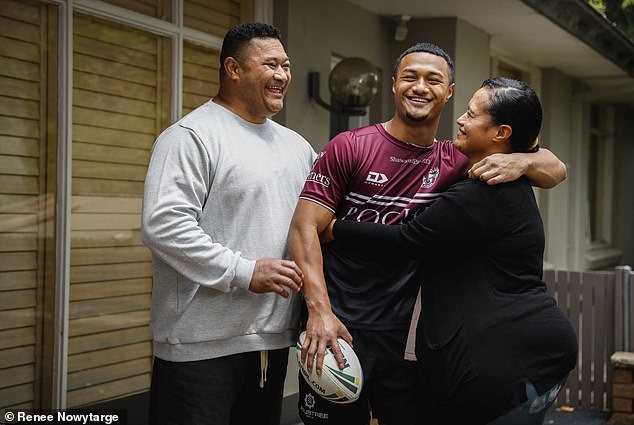 Mother Lily (pictured with son Latu and husband Chris) is very proud of her sons for the incredible act - and says they will save a room for Manase when he comes home