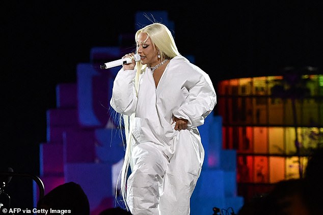 She took the stage for the first time in an all-white jumpsuit that appeared to be some version of a hazmat suit, and started her set with Acknowledge Me.