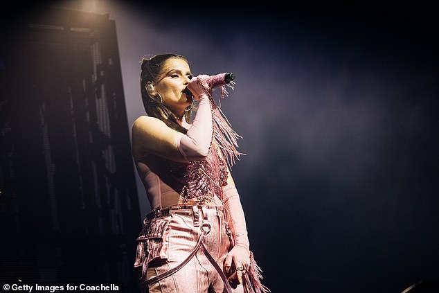 She looked fantastic for the show, where she dazzled in the pink look with leather-look details and tassels that stretched the length of her arms