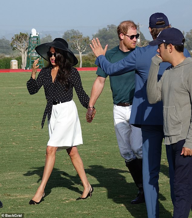 The Duchess previously favored stilettos on sports fields (pictured at a polo match in Santa Barbara in 2022)