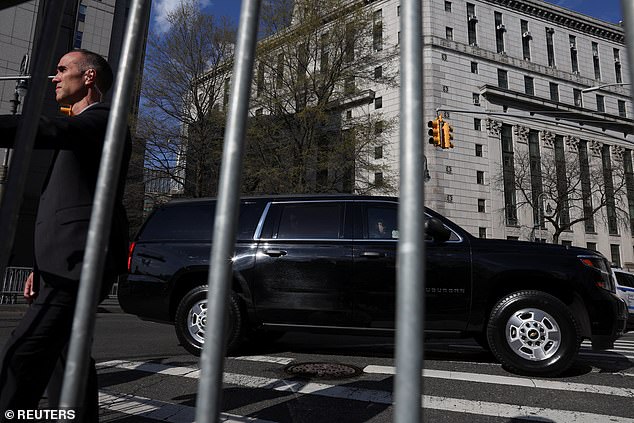 The court was surrounded by protesters and photographers as Trump's motorcade made the four-mile journey downtown to 100 Center Street.