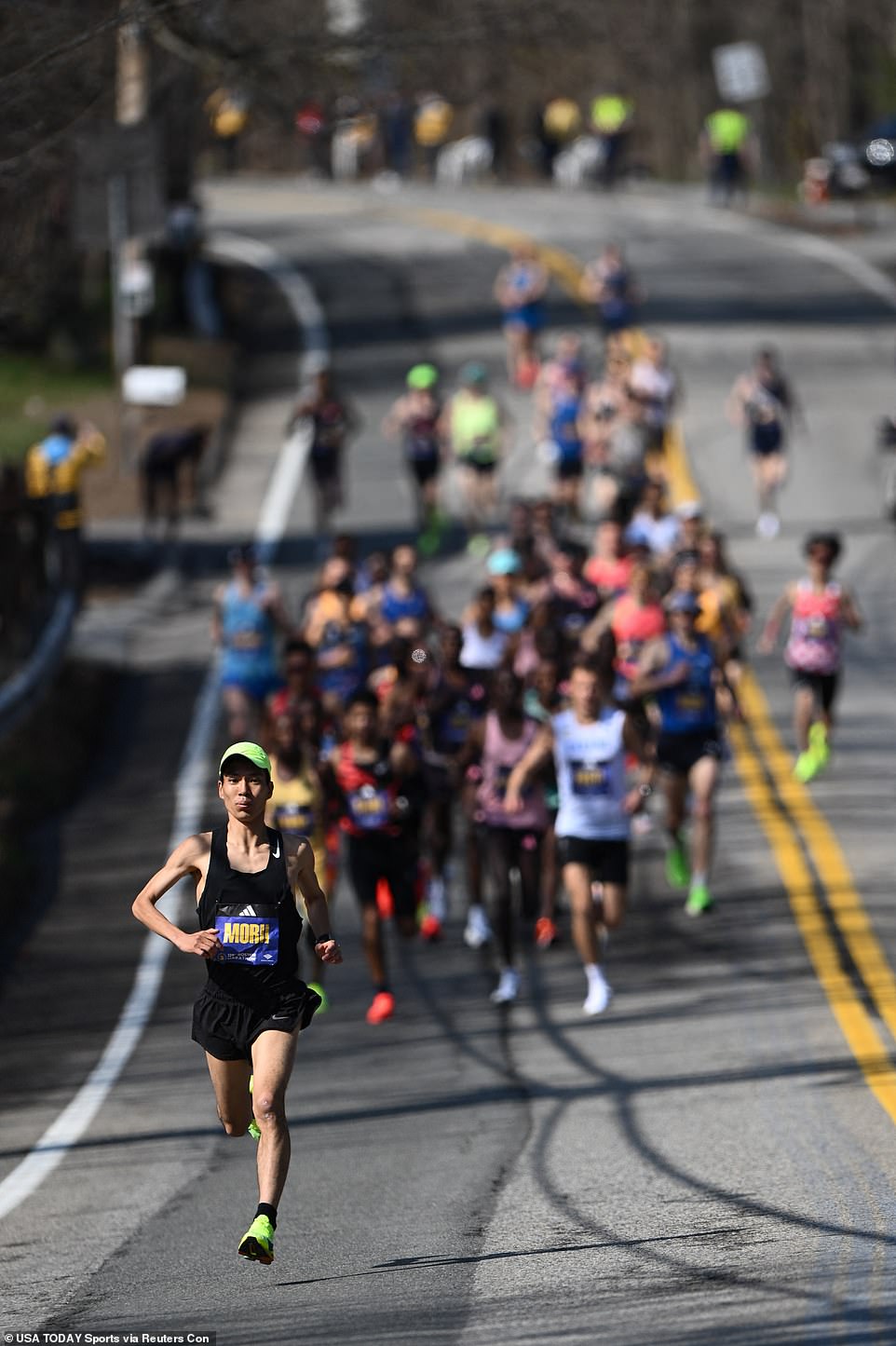 Japan's Yuma Morii pulls away from the pack during the men's elite race in Boston