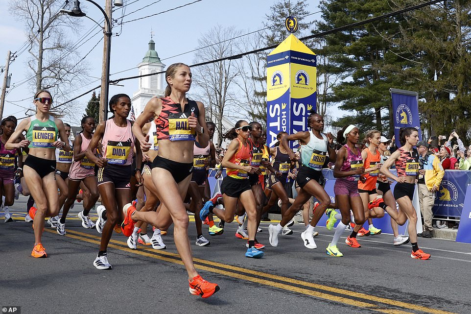 Elite female runners leave the starting line of the Boston Marathon