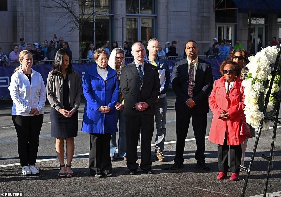 Mayor Michelle Wu, Governor Maura Healey and family members of the Boston Marathon bombing victims lay wreaths at a memorial on Boylston Street on the eleventh anniversary of the attack