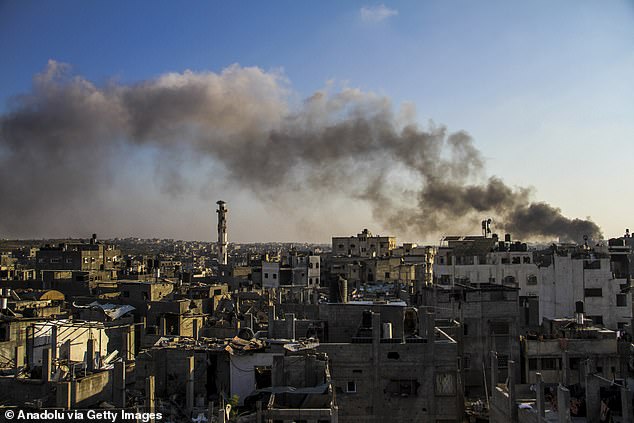 Smoke rises and billows over settlements after the Israeli attack on eastern Jabalia in the northern Gaza Strip