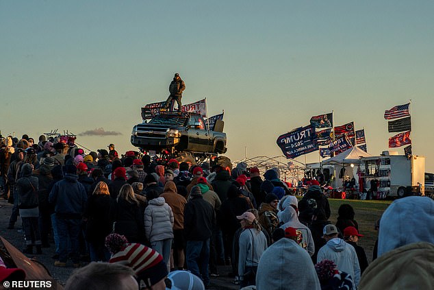 Trump supporters wait to join his rally in Schnecksville, PA on Saturday.  It was the ex-president's last meeting before the hush money trial