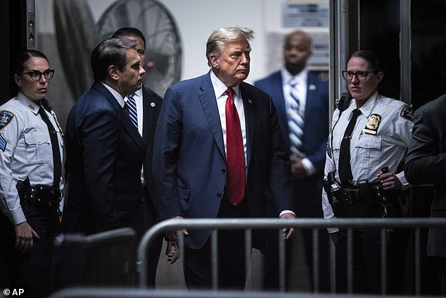 Trump walks into the Manhattan courtroom after a break during jury selection in the case alleging company records were falsified in connection with payments to porn star Stormy Daniels to keep quiet about an affair before the 2016 presidential election