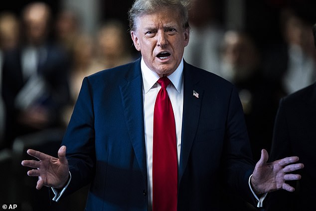 Trump speaks outside the courtroom after arriving at Manhattan Criminal Court on Monday before jury selection began