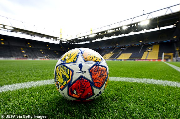 DORTMUND, GERMANY - APRIL 16: A detailed view of an official UEFA Champions League match ball on the pitch ahead of the UEFA Champions League quarter-final second leg match between Borussia Dortmund and Atletico Madrid at Signal Iduna Park on April 16, 2024 in Dortmund, Germany.  (Photo by Oliver Hardt - UEFA/UEFA via Getty Images)