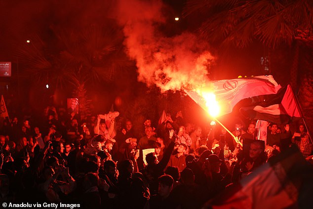 Iranians gather in Tehran to demonstrate in support of their government's attack on Israel