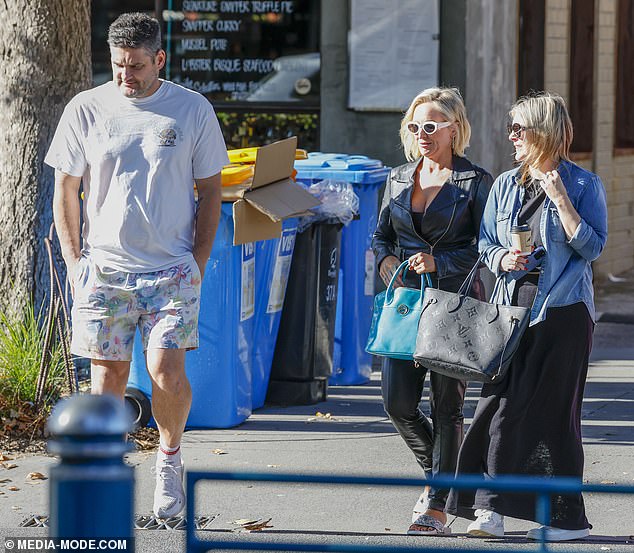 The trio were spotted walking the streets of Melbourne in their small group