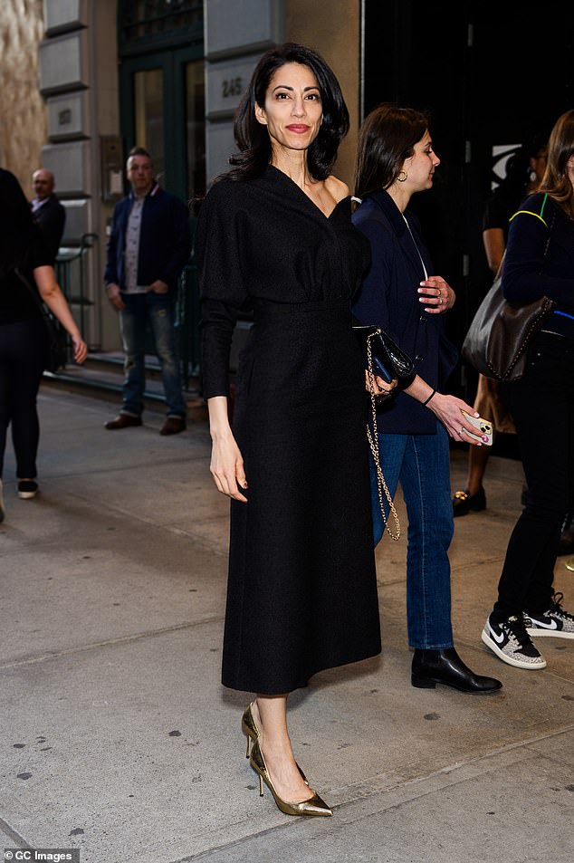 Huma Abedin, 47, also attended the Broadway show, presenting herself elegantly in a black shirt dress with an A-line tea skirt.  The politician wore the dress slightly off one shoulder and wore a pair of metallic gold pumps.  She carried a quilted leather handbag with a gold chain strap and completed her look with a bright red lip