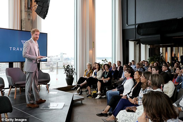 Harry speaks to an audience as he launches Travalyst in Amsterdam