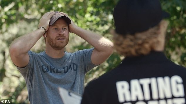 The Duke of Sussex is pictured taking part in a sketch for a sustainable travel campaign for Travalyst, in which he jogs through a forest before being accused of dropping a lollipop wrapper during a trip to New Zealand four years earlier.