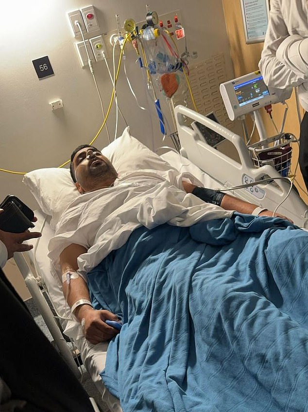 Mr Taha was stabbed in the stomach but managed to call other security personnel for help.  This made him one of the first people to raise the alarm (photo: he is still recovering in hospital)