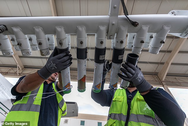 The planes are loaded with salt flares that can be burned to produce more rainfall